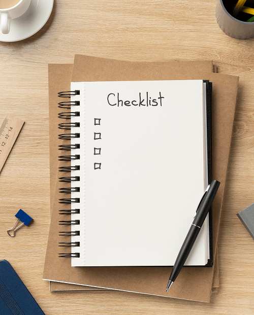 flat-lay-notebook-with-list-desk 1-min